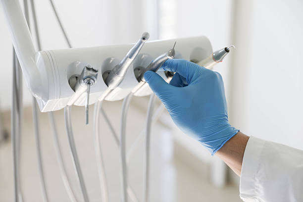 Professional Root Canal Treatment technician working in La Harpe, IL